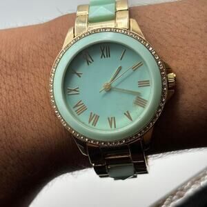 Gold & teal watch